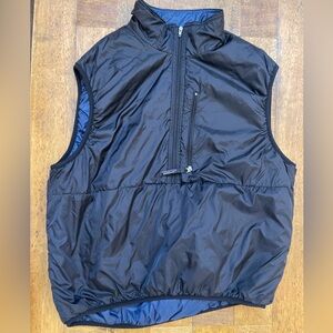 Patagonia black vest with navy liner. Size large.